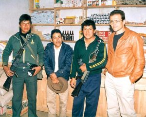 The Rev. Dan McMiller, right, poses with his "hero," Pastor Fidel Convercio Carrera, second from left, and two soldiers in 1987 in Pacllon, Peru. Carrera was "one of our first ordained Peruvians" and continued his ministry even in the face of terrorist attacks and threats to his life, said McMiller, a former missionary to Peru.  Even though missionary service can be difficult, it also can be "the most rewarding time of your life," McMiller says. (Timothy Erickson)