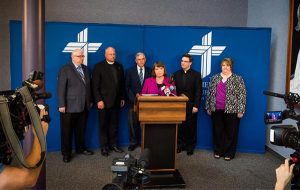 Carol Tobias, president of National Right to Life, speaks at a July 16 press conference with fellow members of the LCMS Sanctity of Life Committee at the LCMS International Center. With her, from left, are the Rev. Dr. Kevin Voss, Concordia Bioethics Institute director; the Rev. Dr. Jonathan Lange, pastor of Our Savior Lutheran Church, Evanston, Wyo.; the Rev. Dr. James Lamb, Lutherans For Life executive director; the Rev. Christopher Esget, pastor of Immanuel Lutheran Church, Alexandria, Va.; and Tracy Quaethem, project coordinator for LCMS Life Ministry. (LCMS/Erik M. Lunsford) 