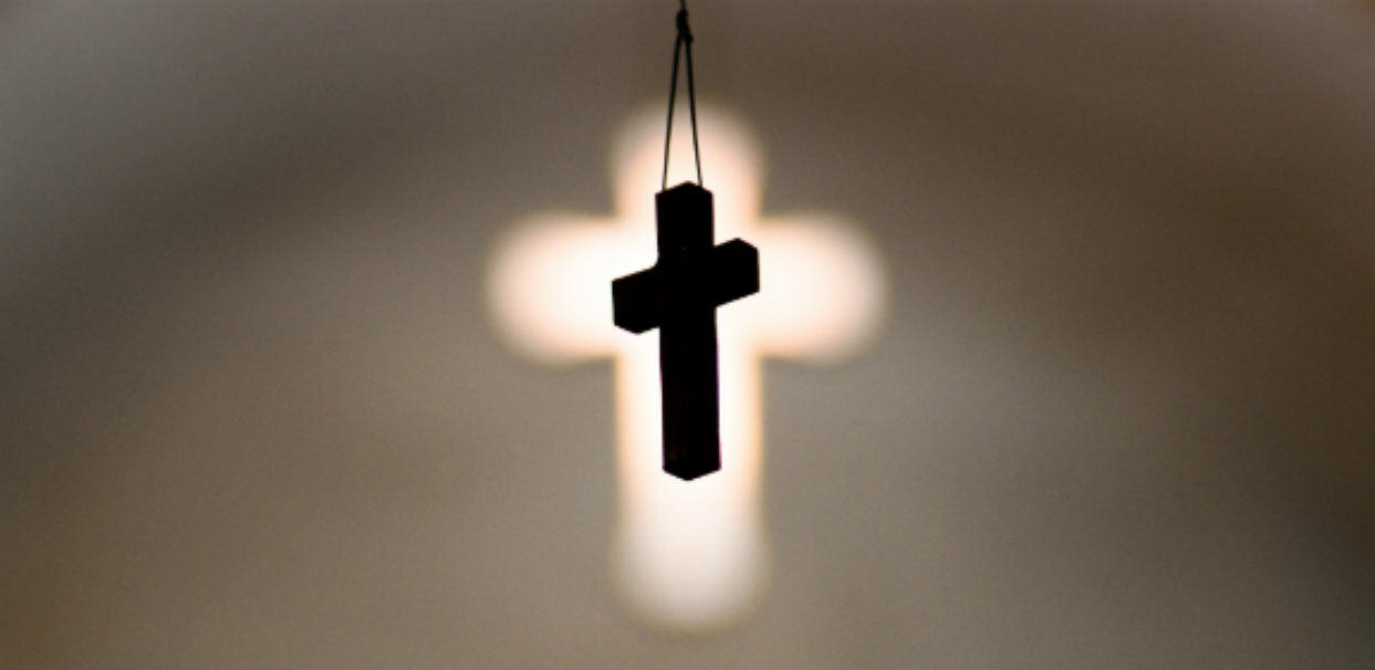 A small cross hangs from the ceiling at Zion Evangelical Lutheran Church, Lu Verne, Iowa, on Sunday, July 9, 2017. LCMS Communications/Erik M. Lunsford
